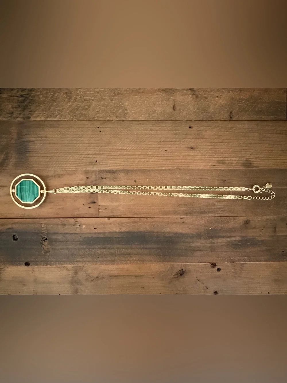 CONNIE CRAIG CARROLL “JONES GOLD-PLATED REVERSIBLE CABOCHON PENDANT NECKLACE